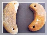 Pesi da telaio reniformi rinvenuti nel corso degli scavi Contu